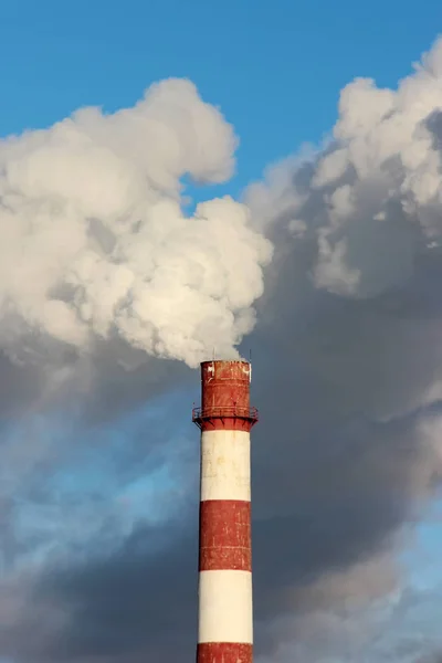 Dense smoke burst from the pipe. — Stock Photo, Image