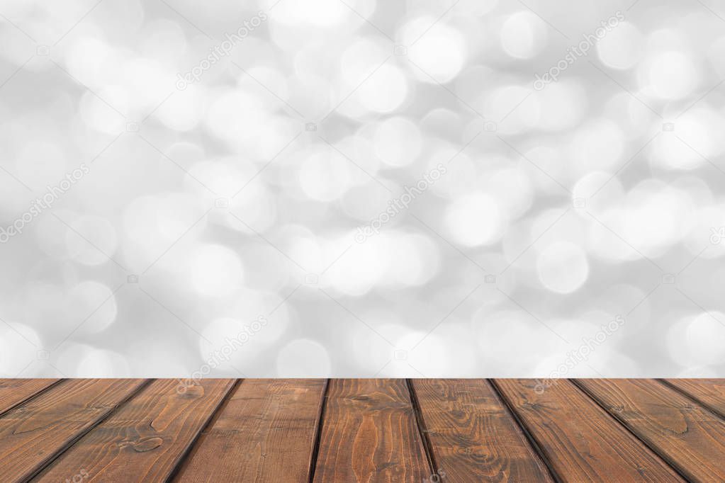 Wood table top on abstract blur white background