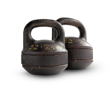 İki beyaz bir arka planda açılır kapanır kettlebell demir.