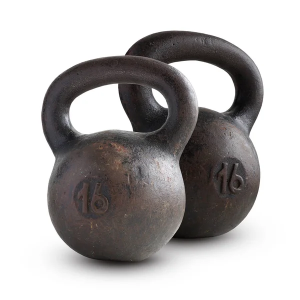 Dva staré kettlebell, 16 kg, izolované na bílém pozadí. — Stock fotografie