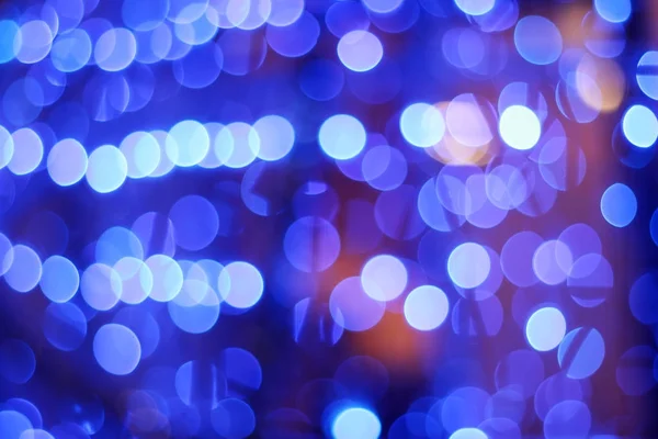 Fundo borrado festivo com luzes azuis . — Fotografia de Stock