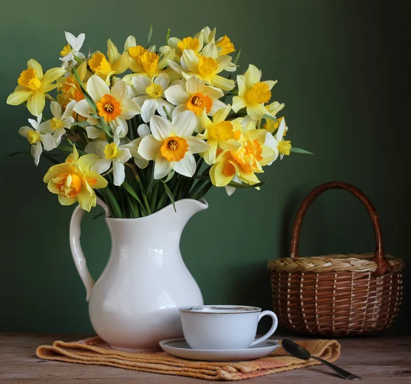 Yellow daffodils in a white jug — Stock Photo, Image