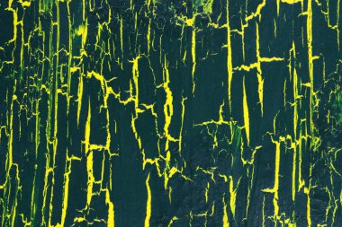 Sarı yüzeyi koyu yeşil boya kırık