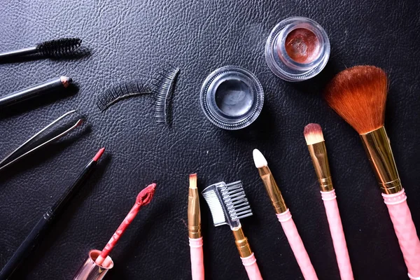 Makeup kit on leather — Stock Photo, Image