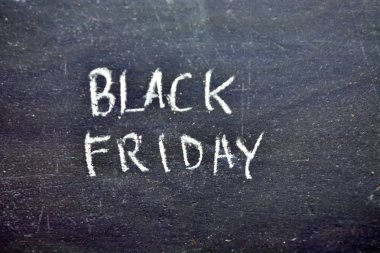 Siyah Cuma Kara tahta üzerinde el yazısı