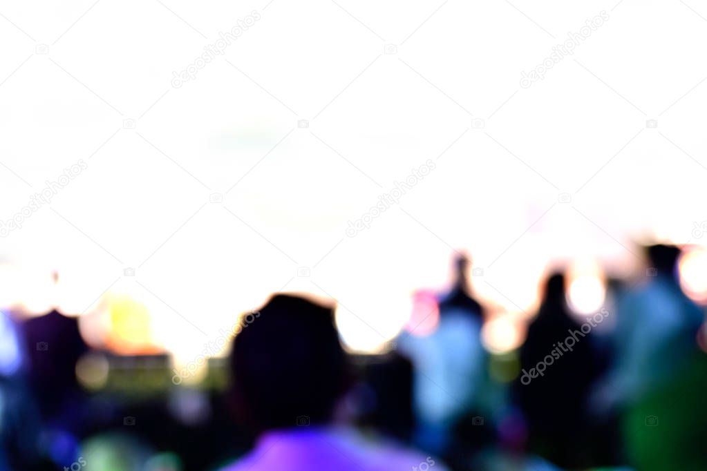 Audience in a concert against white background.
