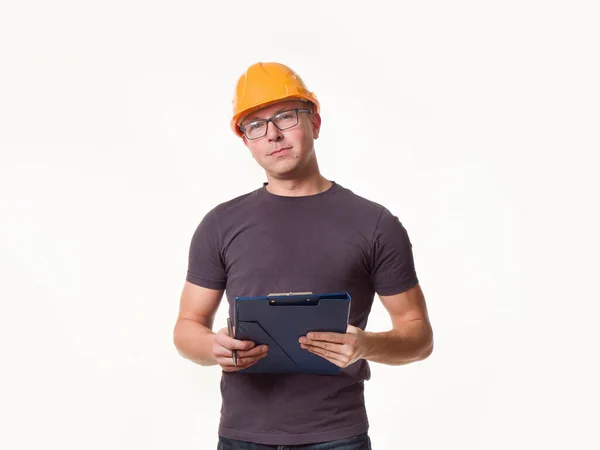 Genç adam - klasörlü miğferli işçi