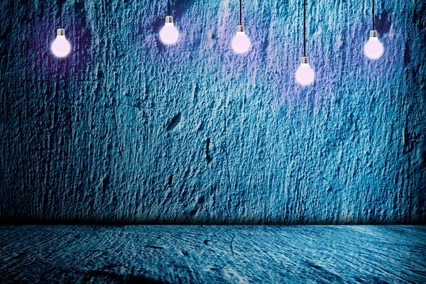 Hanging Light Bulb in the Empty Concrete Room — Stock Photo, Image