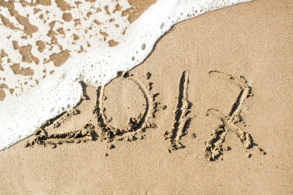 Inscription 2017 on the sand — Stock Photo, Image