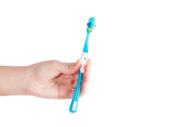 New tooth brush in hand isolated on white background. — Stock Photo, Image