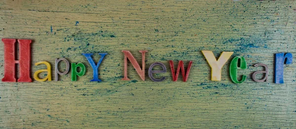 Çok renkli yazıt mutlu yeni yıl — Stok fotoğraf