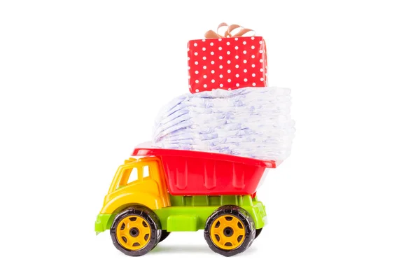 Toy truck with a pile of diapers — Stock Photo, Image