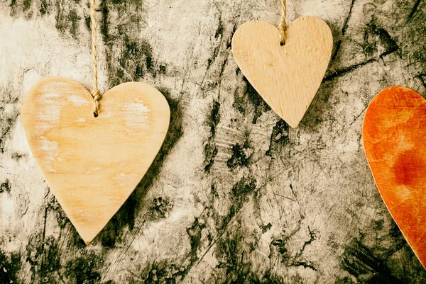 Wood hearts on wall background — Stock Photo, Image