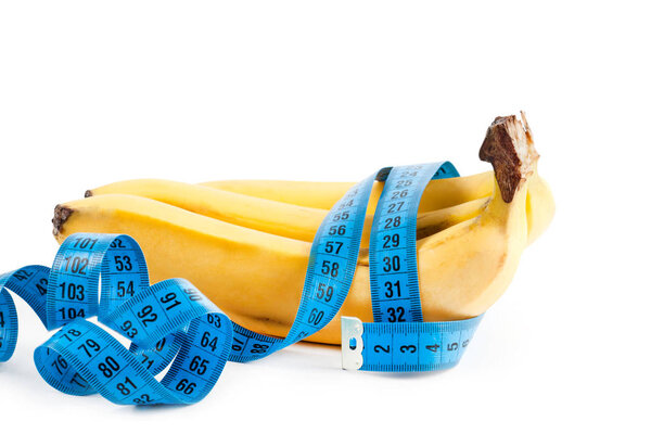 Fresh banana and measuring tape