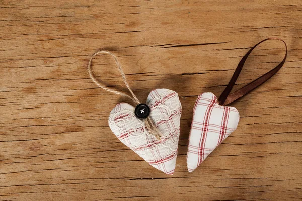 Heart made of cloth on wood desk — Stock Photo, Image