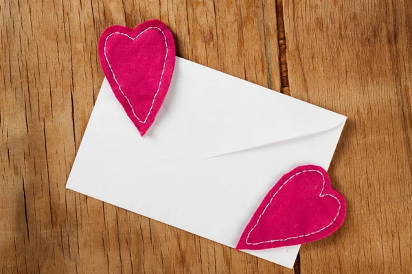 Heart made of cloth with card — Stock Photo, Image