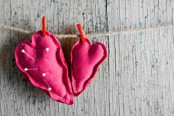 Heart from cloth on wood desk — Stock Photo, Image