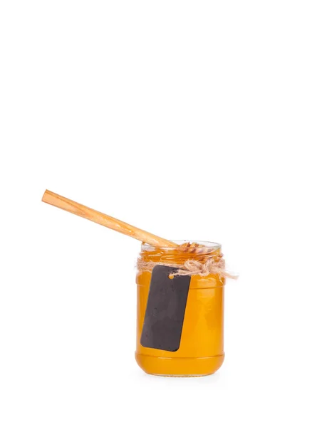 Frasco de vidro com mel — Fotografia de Stock