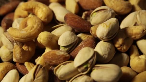 Ořechy pozadí s smíšené sortiment semen — Stock video
