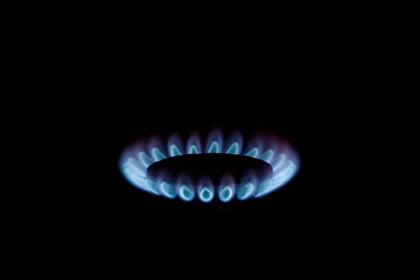 Blue gas flame on a black background — Stock Photo, Image