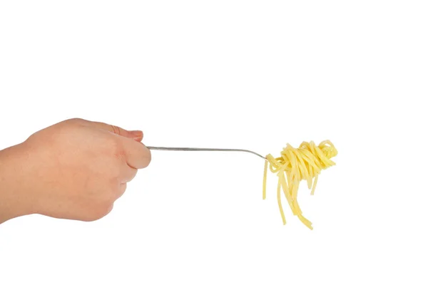 Fertige Spaghetti auf einer Gabel in der Hand — Stockfoto