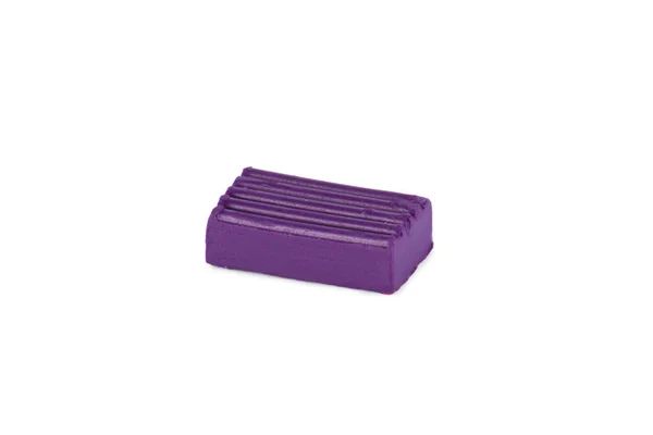 Кусок фиолетового пластилина — стоковое фото