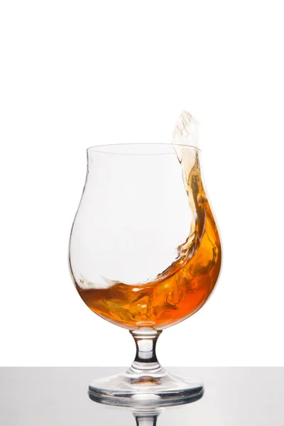 Cognac in wineglass isolated on white — Stock Photo, Image