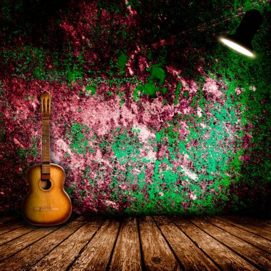 Boş odada eski gitar