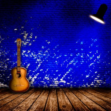 Boş odada eski gitar