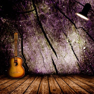 Boş odada eski gitar