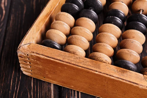 Abacus vintage sobre fondo de madera — Foto de Stock