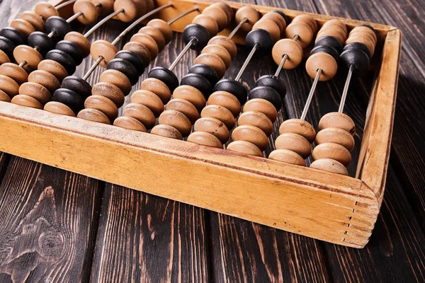 Abacus vintage sobre fondo de madera — Foto de Stock