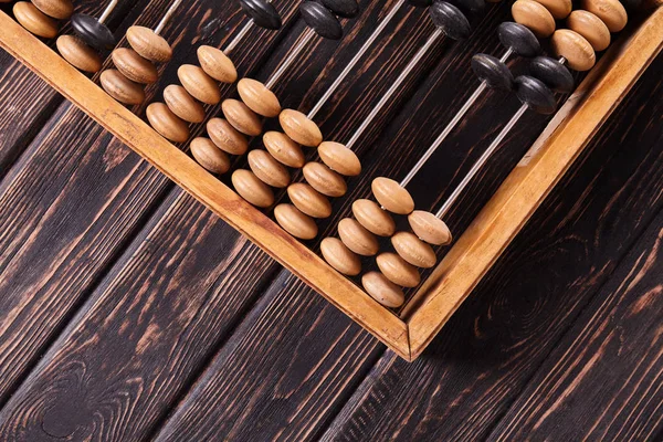 Abacus vintage sobre fondo de madera — Foto de Stock