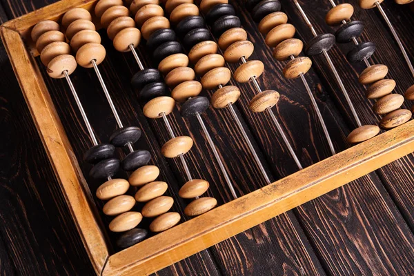 Abacus vintage sobre fondo de madera — Foto de Stock