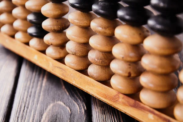 Abacus vintage sobre fondo de madera — Foto de Stock