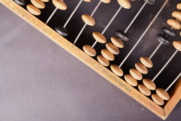 Abacus vintage sobre fondo de madera — Foto de Stock