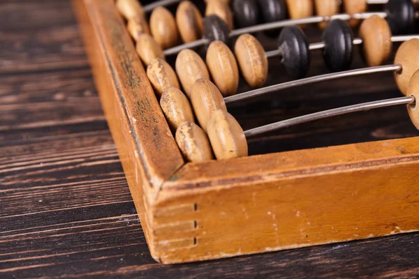 Abacus vintage sobre fondo de madera — Foto de Stock