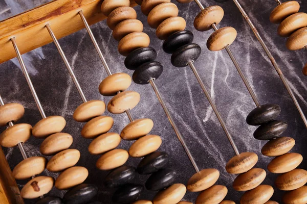 Vintage abacus on wooden background Stock Image