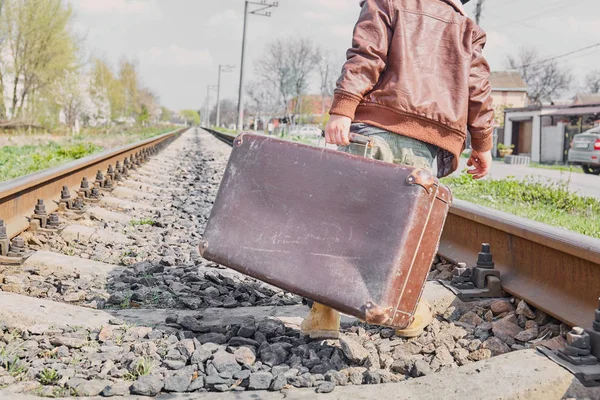 Little boy with suit case