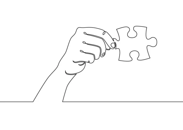 Одна безперервна намальована долоня з однією рукою тримає головоломку . — стокове фото