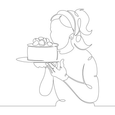 Pasta şefi mutfakta kek pişiriyor.