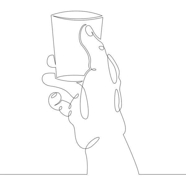 Hand houdt een glas met alcohol — Stockfoto