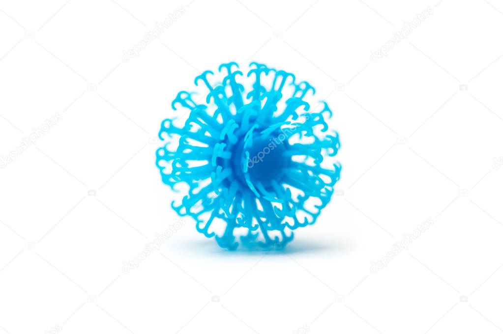 Blue piece of a children's designer Velcro on a white background