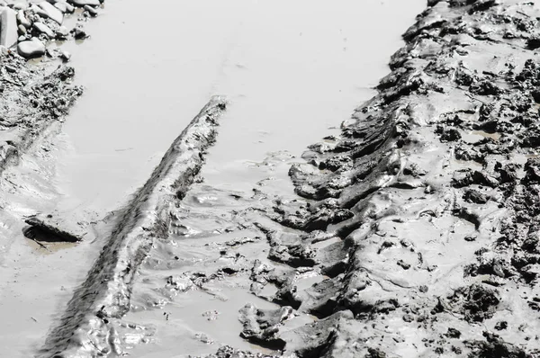 Marcas de pneus na lama closeup — Fotografia de Stock