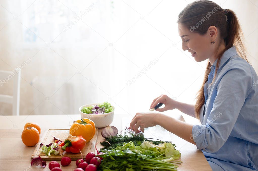 A woman prepares Breakfast from vegetables