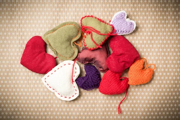 Colorful knitted hearts