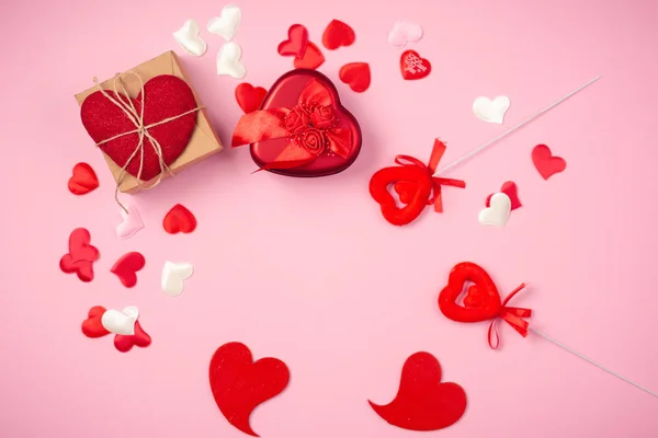 Red hearts with a gift for Valentines Day — Stock Photo, Image