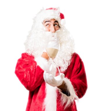 kum saati ile Noel Baba