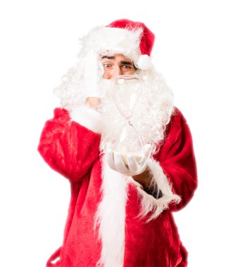 kum saati ile Noel Baba