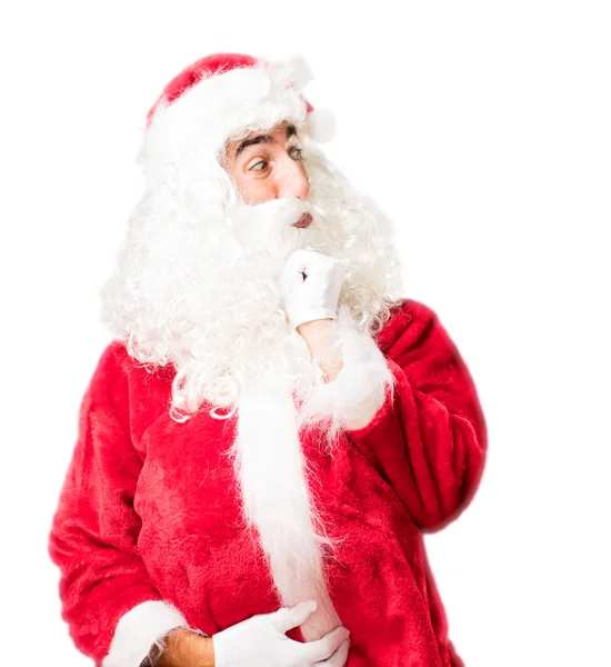 Santa claus denken over iets — Stockfoto